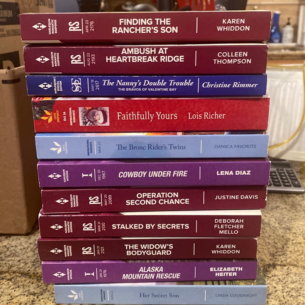 12 harlequin books like new condition
